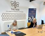 The Hive with logo wall