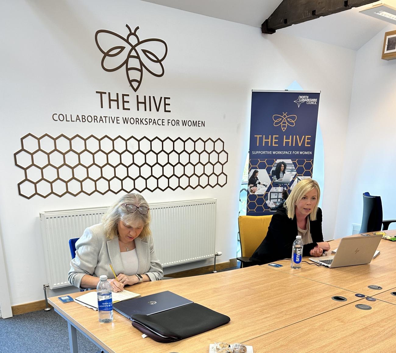 The Hive with logo wall